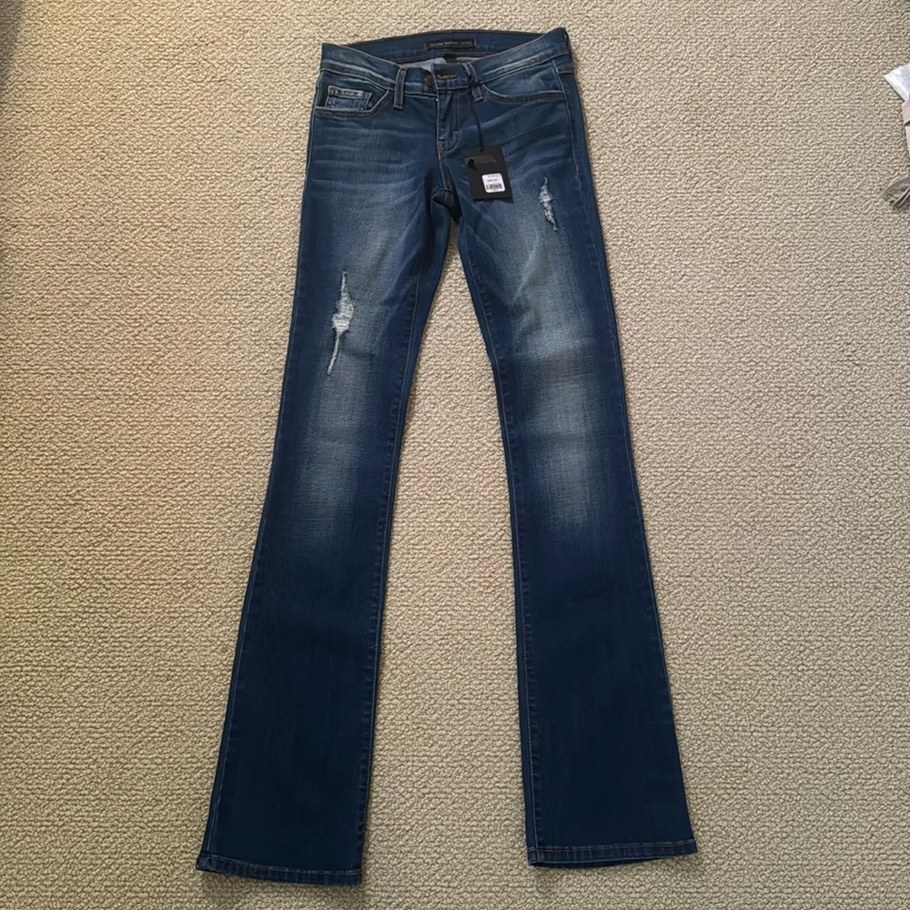 Flying Monkey low waisted skinny jeans with a fare at the bottom.